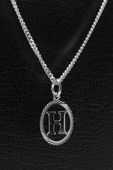 Zilveren letter H hanger - rond